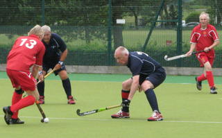 Auld stands firm against England Over 65s player Hutchings